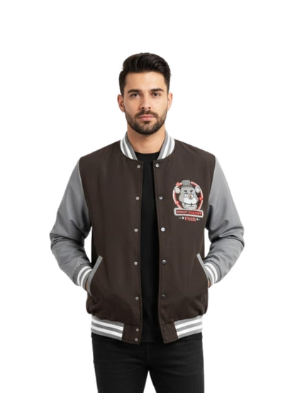 Man wearing a brown and gray varsity jacket with a logo on a white background