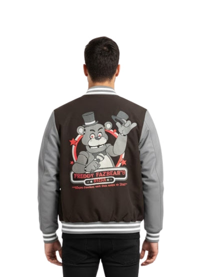 Person wearing a black and gray jacket with a graphic design on the back, on a white background