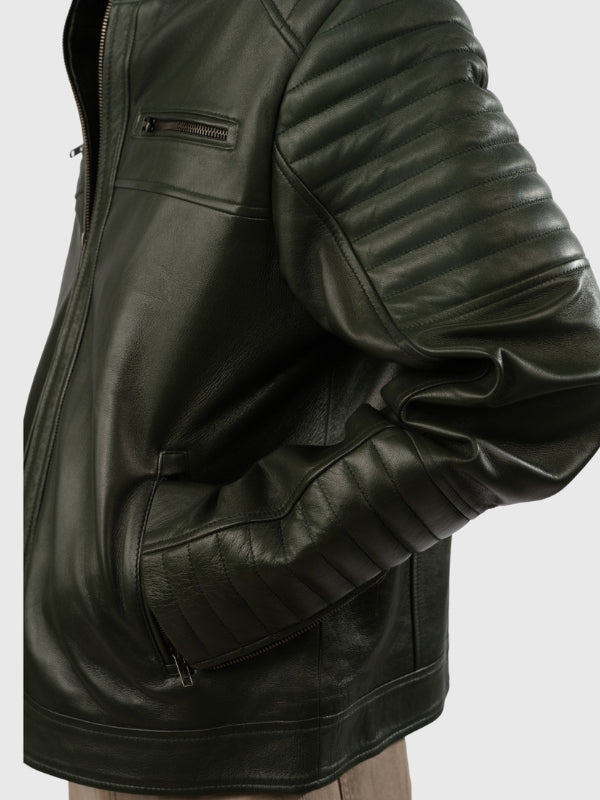 Green leather jacket on a plain background