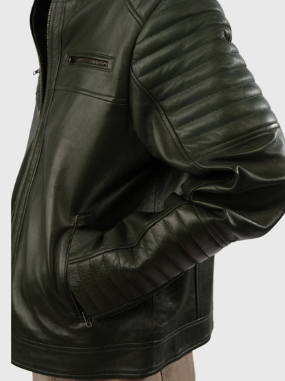 Green leather jacket on a plain background