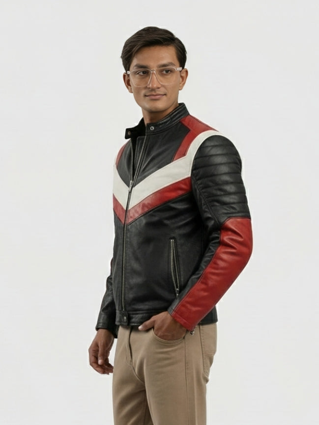 Man wearing a black and red leather jacket with white stripe on a gray background