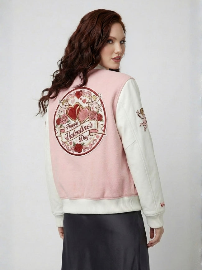 Person wearing a pink and white jacket with Valentine's Day design on a plain background