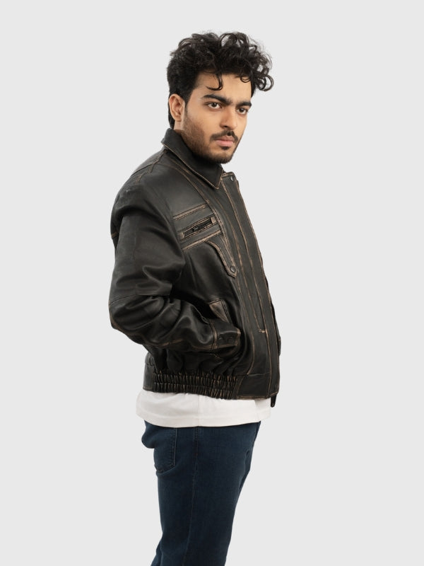 Man wearing a dark brown leather jacket on a white background