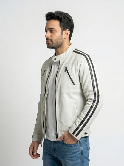 Man wearing a light gray jacket with black stripes on a white background
