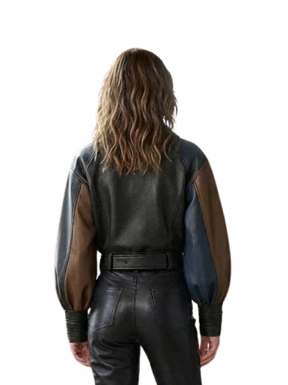 Person wearing a black and brown leather outfit with a white background