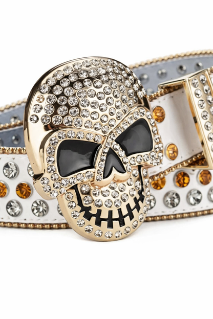Decorative belt with a skull design and rhinestones on a white background