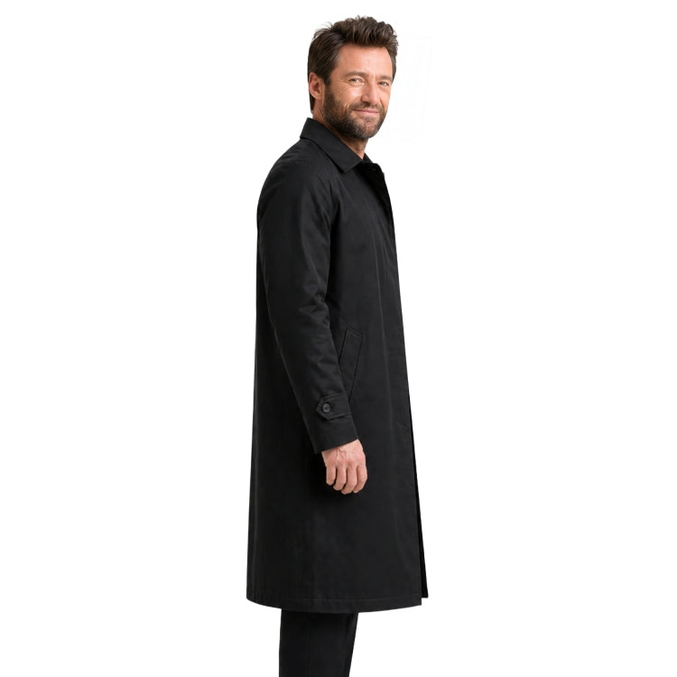 Man wearing a black coat on a white background