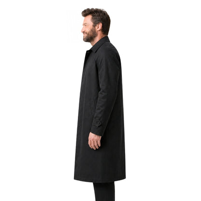 Man wearing a black coat on a white background