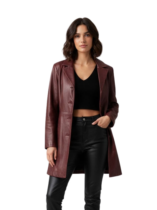 Woman wearing a burgundy leather coat on a white background