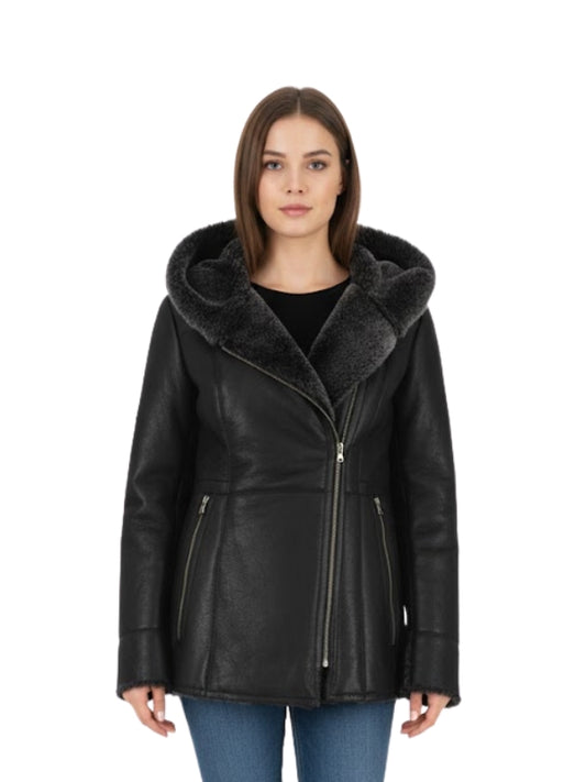 Woman wearing a black leather jacket with fur collar on a white background