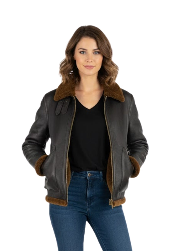 Woman wearing a black leather jacket with brown fur trim on a white background