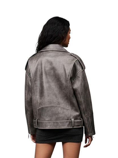 Person wearing a gray leather jacket on a white background