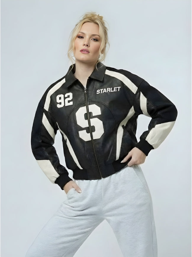 Person wearing a black and white jacket with 'Starlet' branding on a light gray background