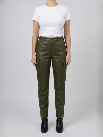 Person wearing olive green pants and a white shirt on a plain background