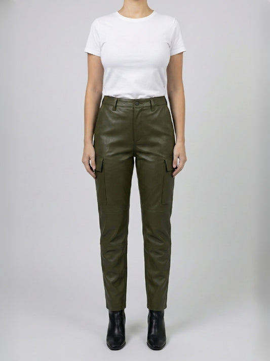 Person wearing olive green pants and a white shirt on a plain background
