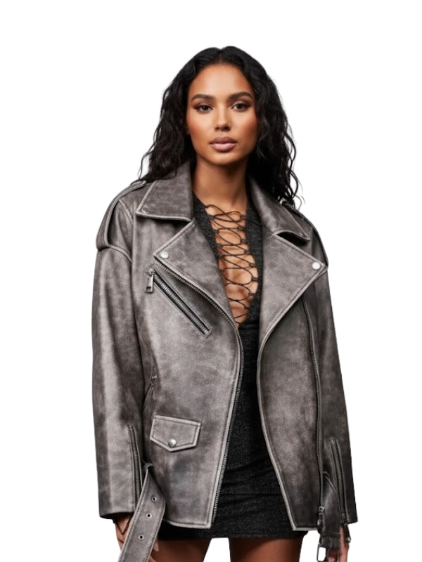 Woman wearing a gray suede jacket on a white background