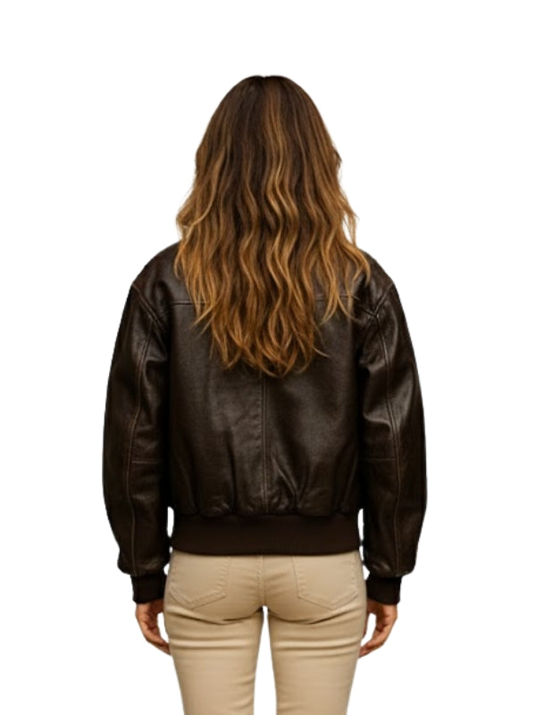 Person wearing a brown leather jacket on a white background