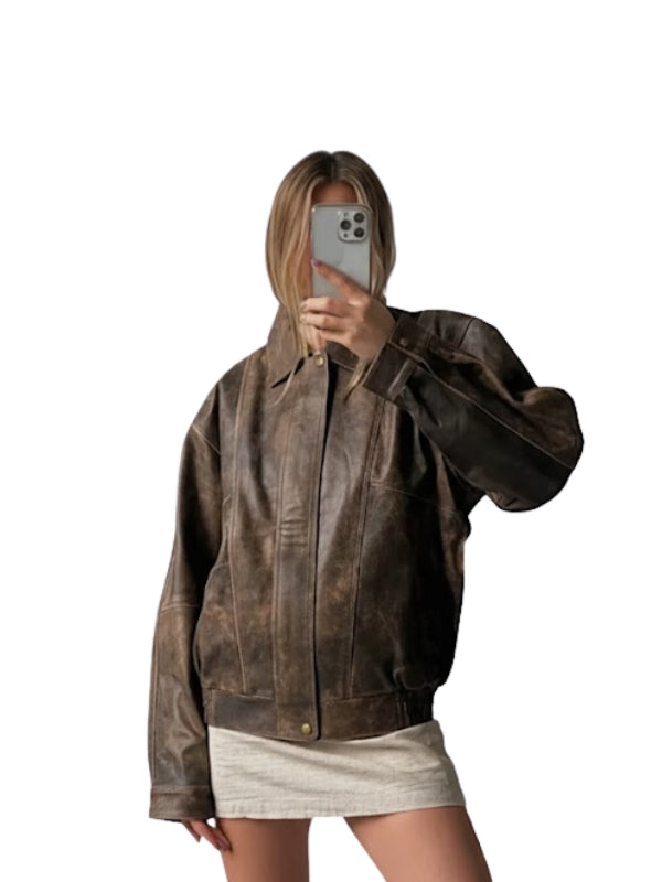 Person wearing a brown leather jacket on a white background