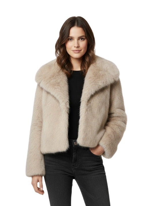 Woman wearing a beige fur jacket on a white background