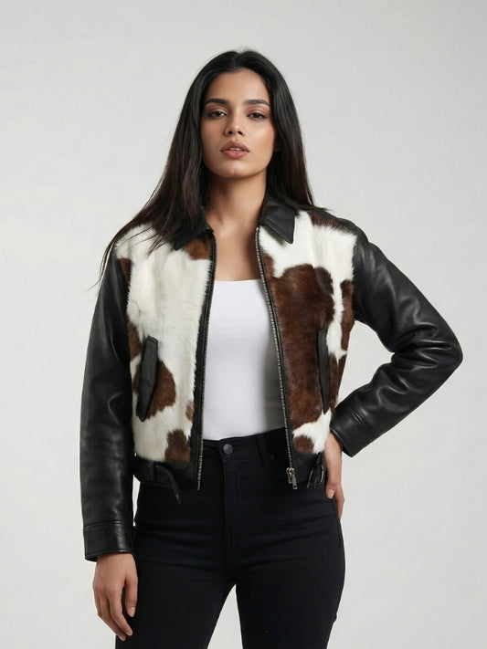 Woman wearing a black leather jacket with cowhide pattern on a white background