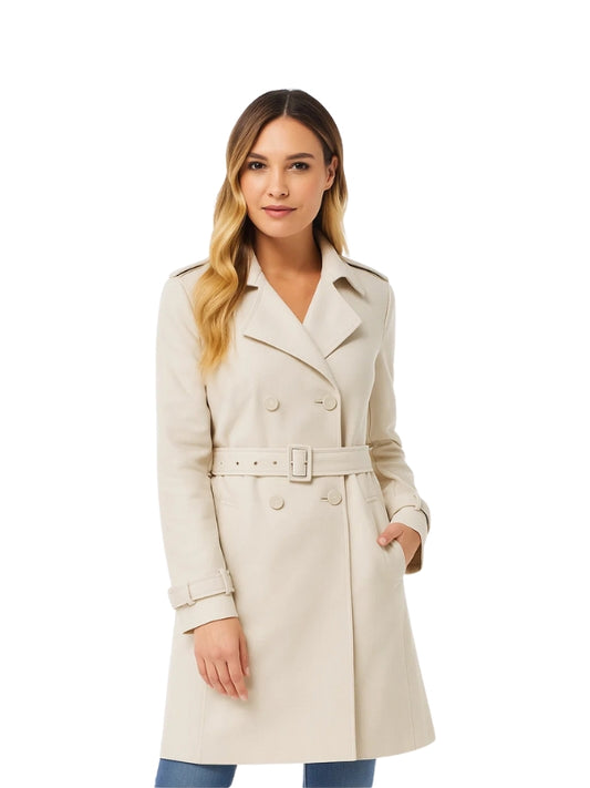 Woman wearing a beige trench coat on a white background