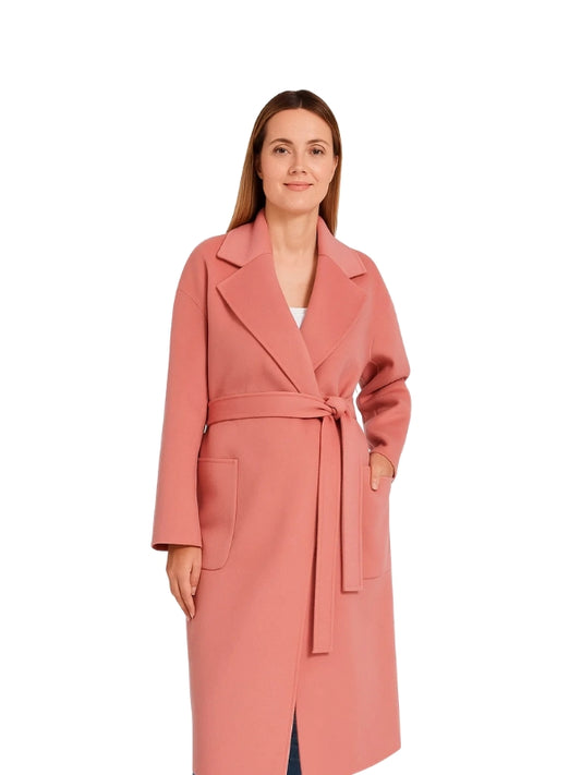 Woman wearing a pink coat on a white background