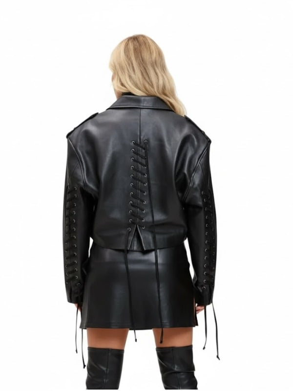 Black leather jacket with lace-up back worn by a person on a white background