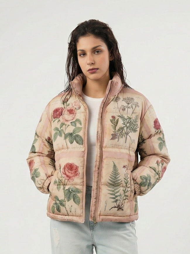 Woman wearing a floral-patterned puffer jacket on a white background
