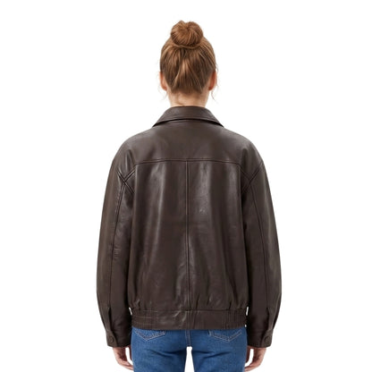Person wearing a brown leather jacket on a white background