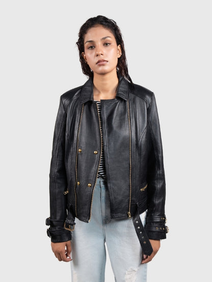 Person wearing a black leather jacket on a white background