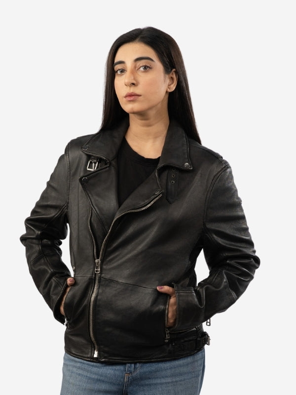 Woman wearing a black leather jacket on a white background