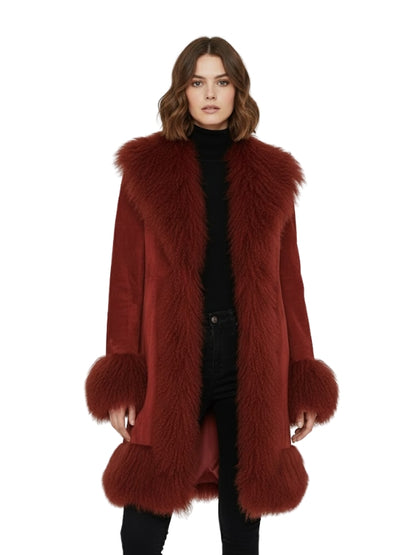 Red fur coat worn by a model on a white background