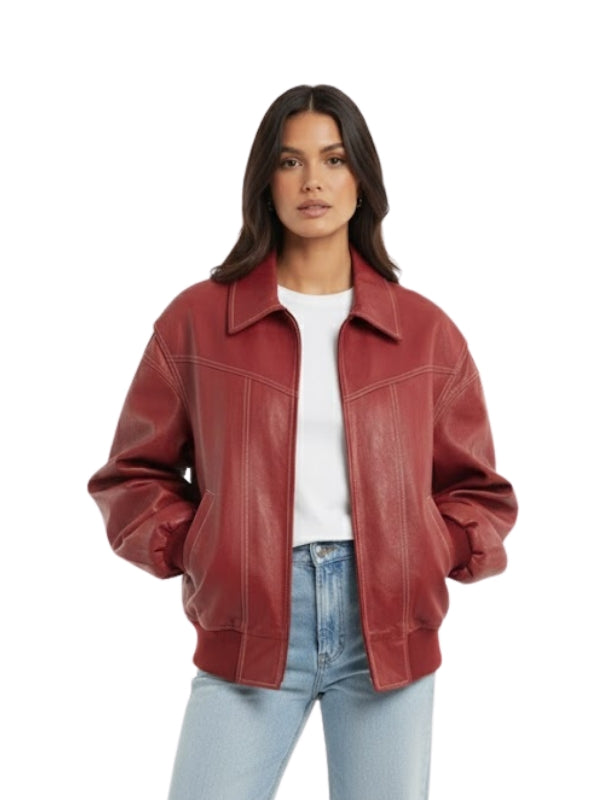Woman wearing a red leather jacket on a white background