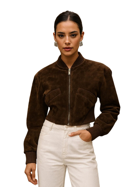 Woman wearing a brown suede jacket and white pants on a white background
