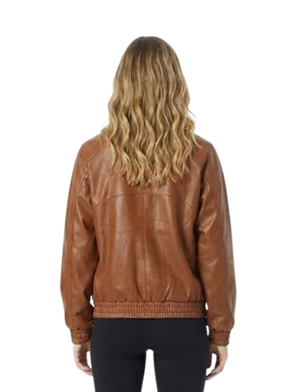 Person wearing a brown leather jacket on a white background
