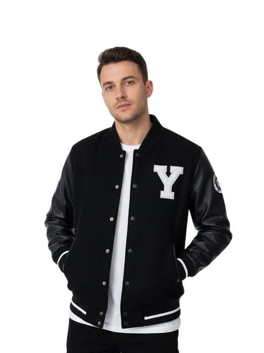 Man wearing a black varsity jacket with a white 'Y' emblem on a white background