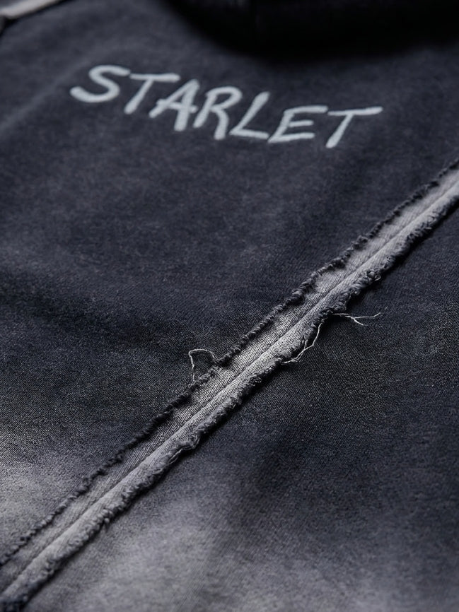 Black fabric with 'STARLET' embroidered on it